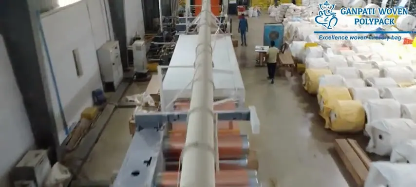 Tape plant with rolls of woven fabric in stock